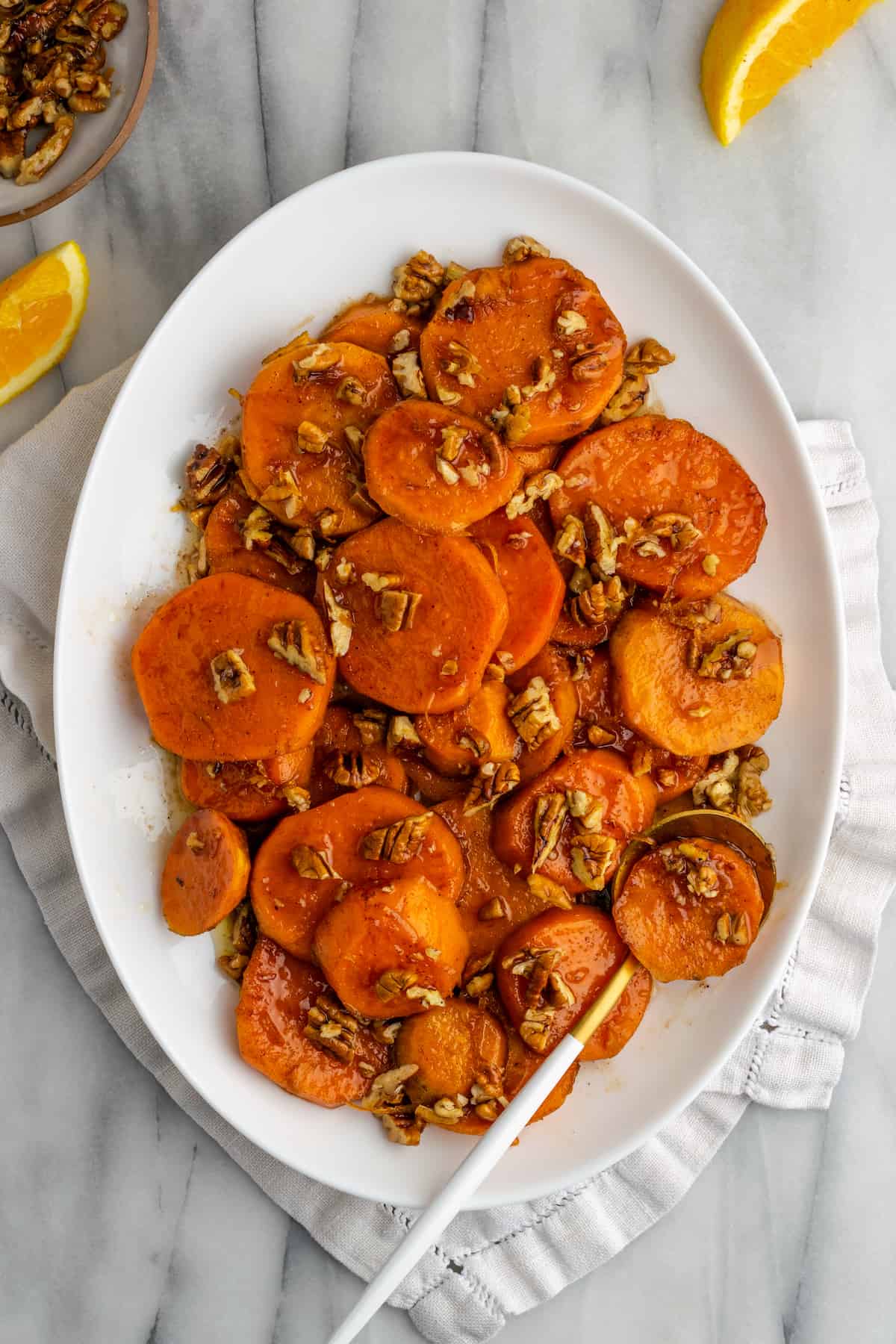 A serving plate of candied yams