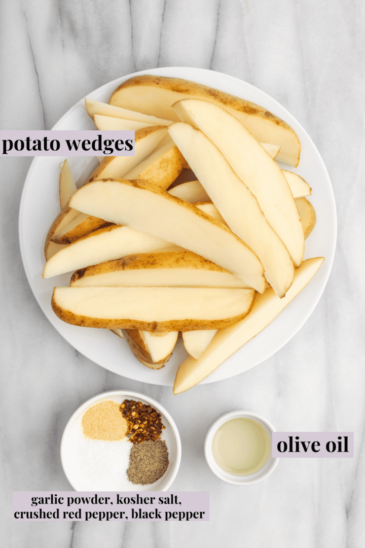 View of all the ingredients for air fryer potato wedges