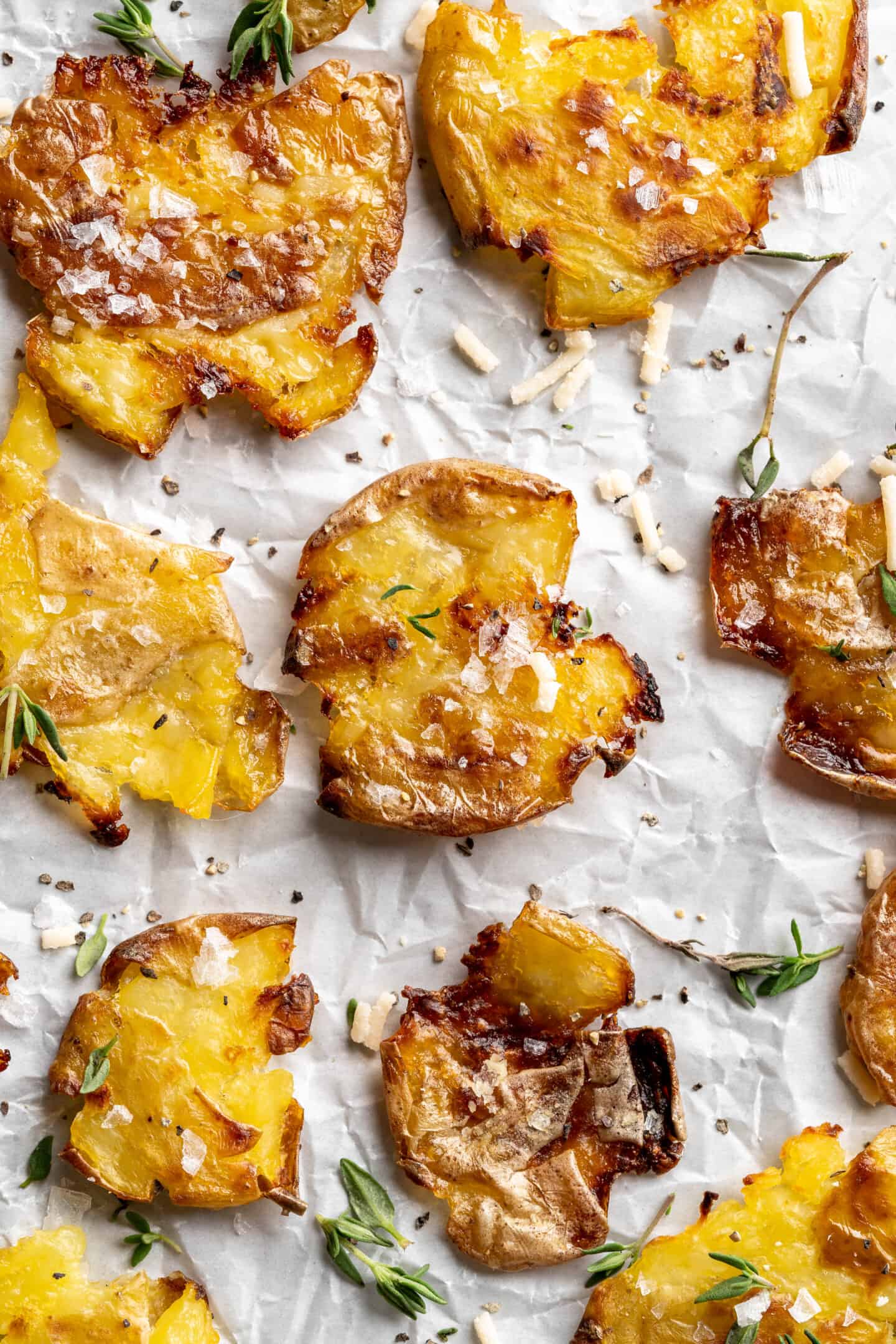 Close up of crispy smashed potatoes on a sheet pan