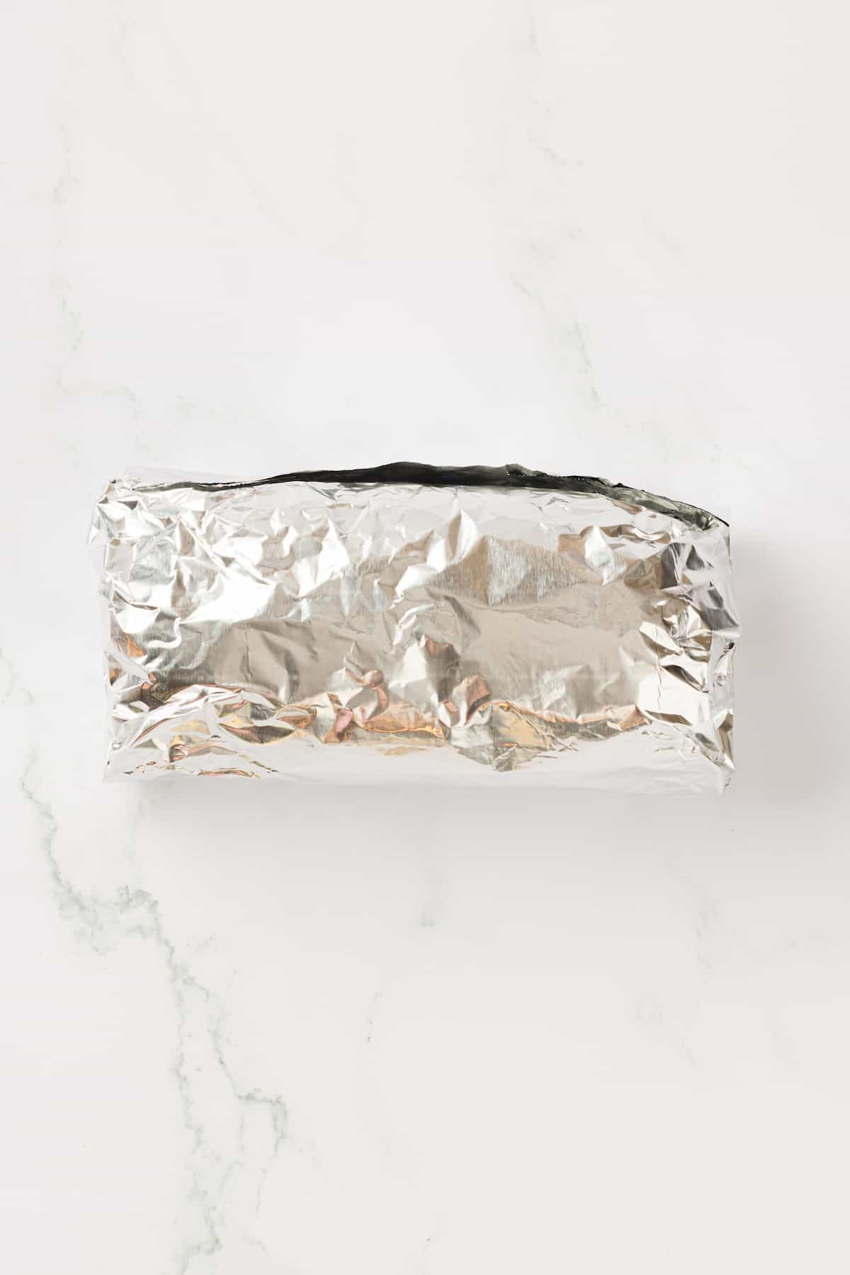 Vegan chicken wrapped in foil
