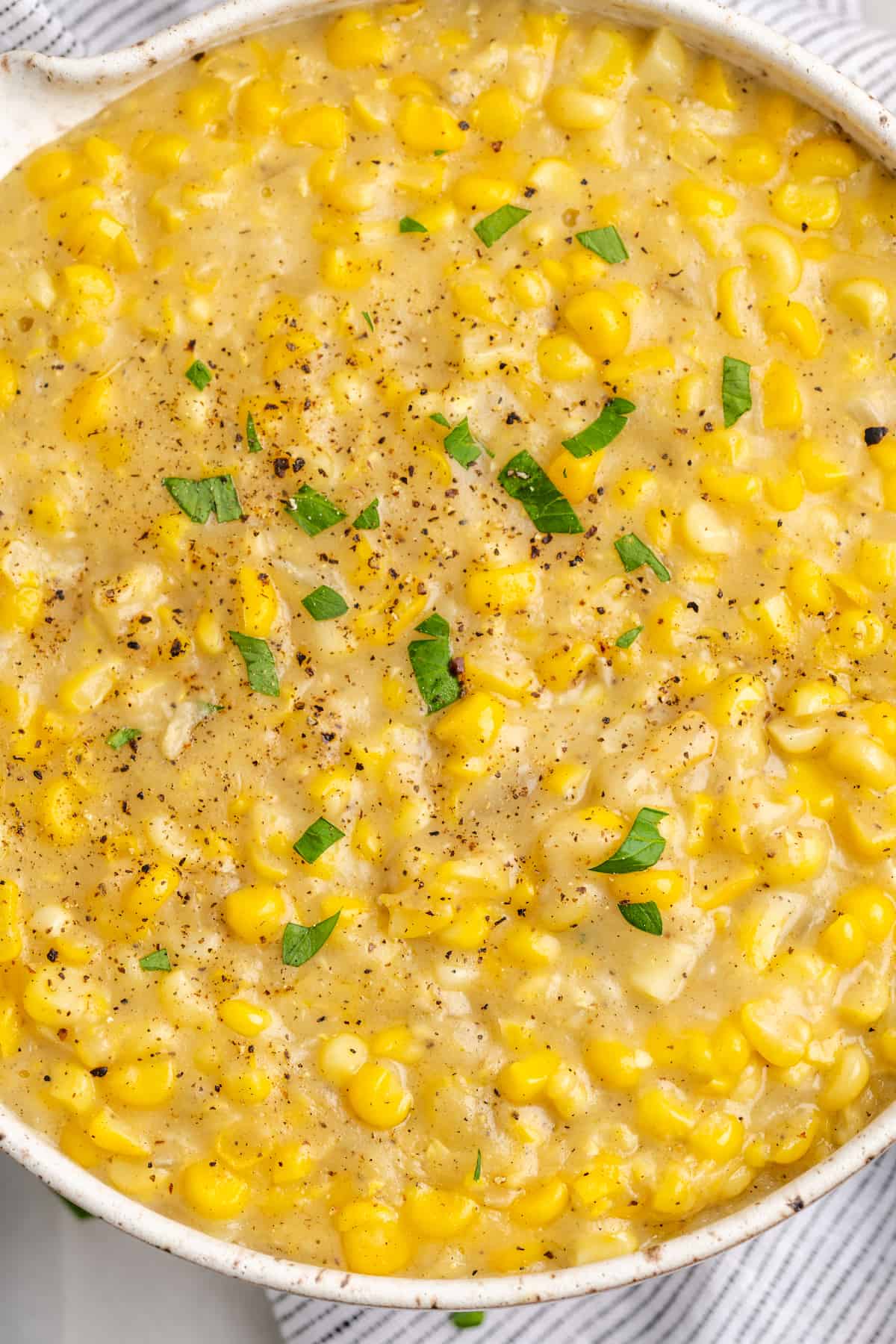 Overhead view of vegan creamed corn in bowl