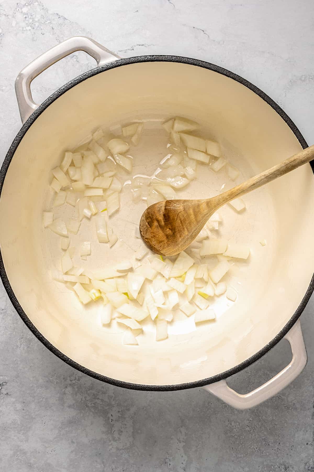 Onions and oil cooking in pot