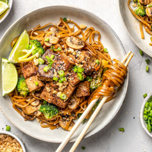 Vegan pad see ew with noodles wrapped around chopsticks