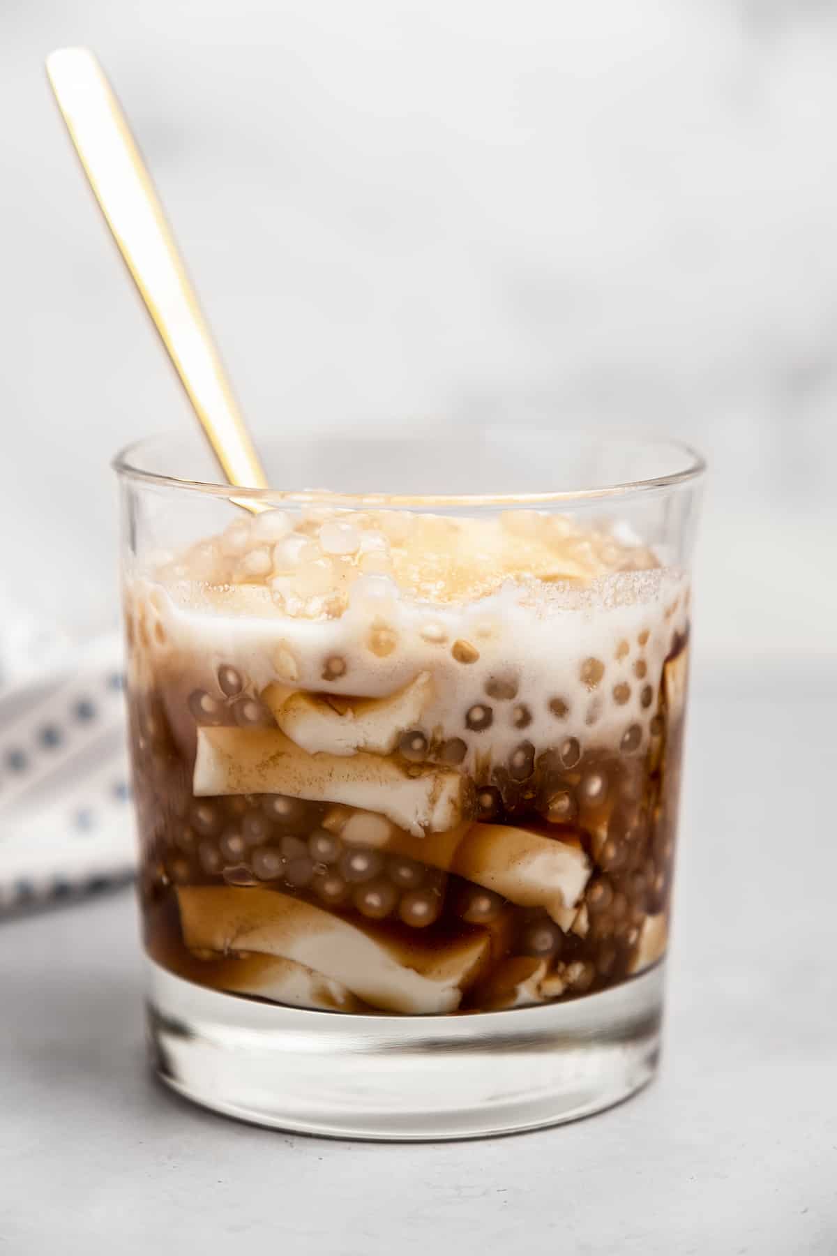 Glass of taho with spoon