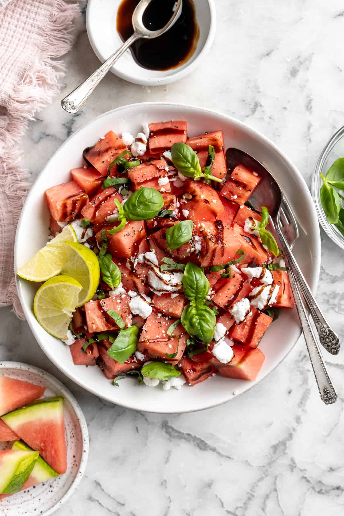 Overhead view of vegan watermelon feta salad in serving bowl