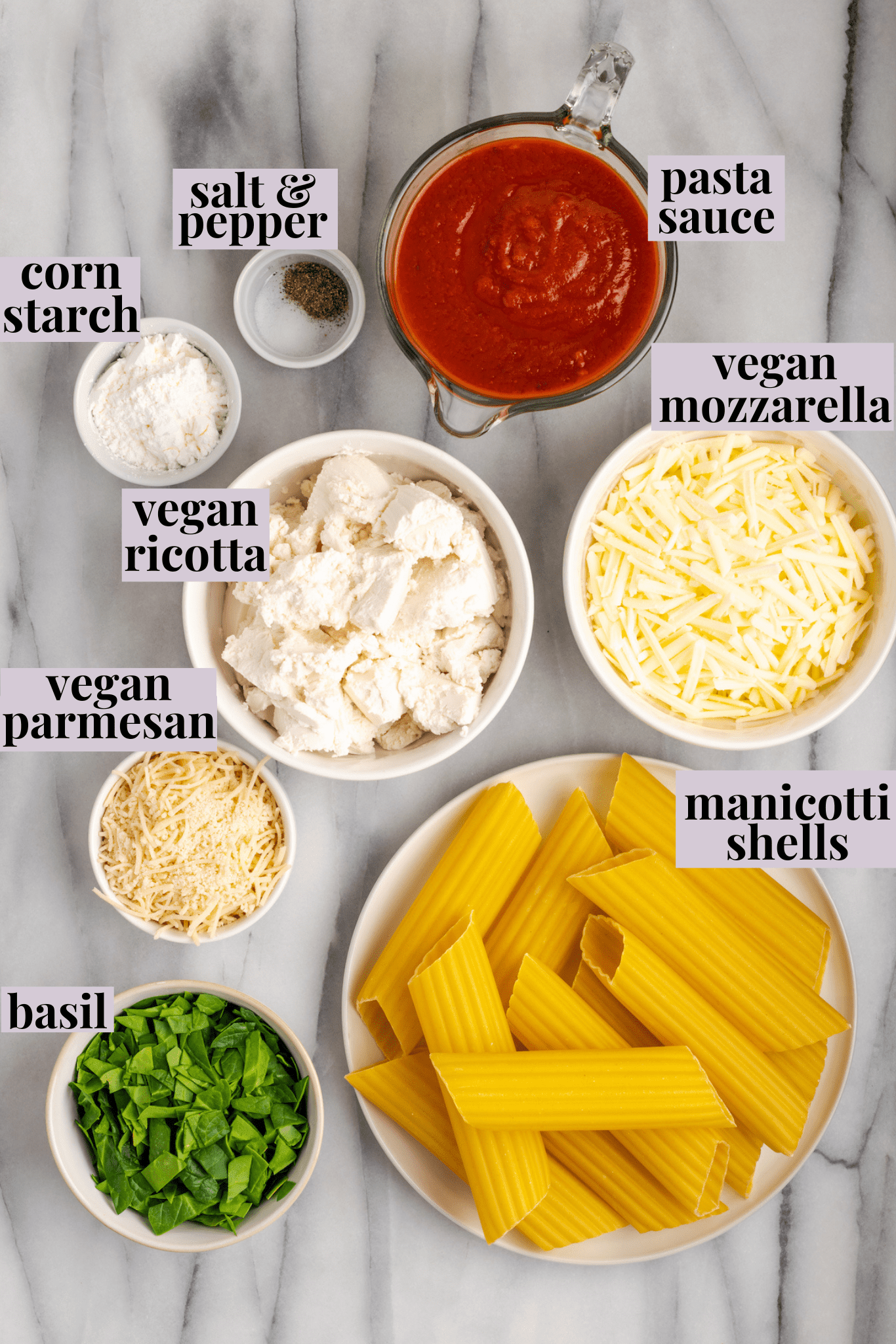 Overhead view of ingredients for vegan manicotti with labels