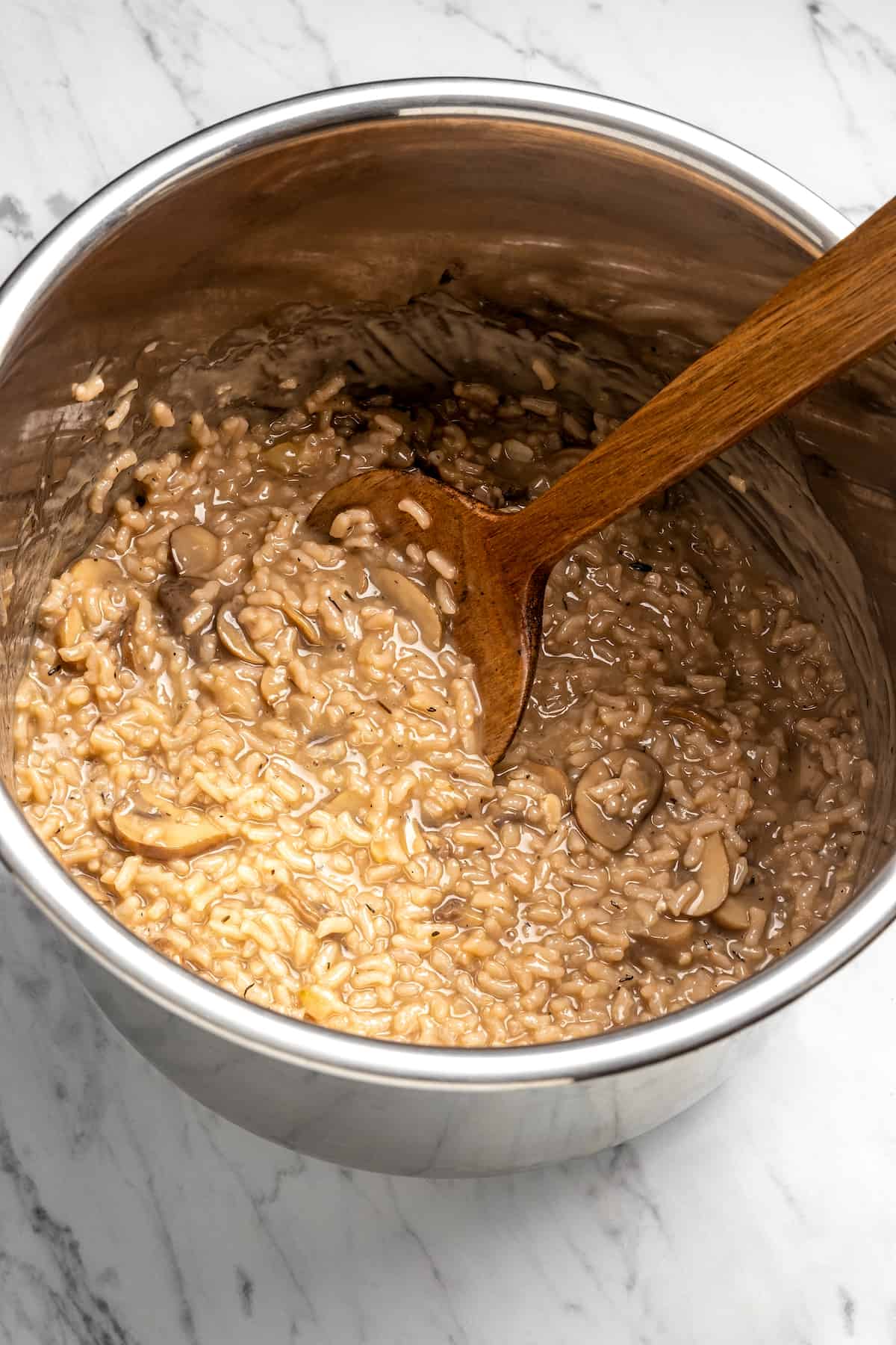 Overhead view of vegan risotto in Instant Pot insert