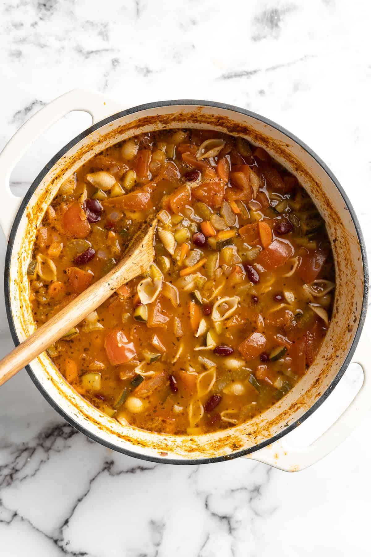 Overhead view of vegan minestrone soup in pot