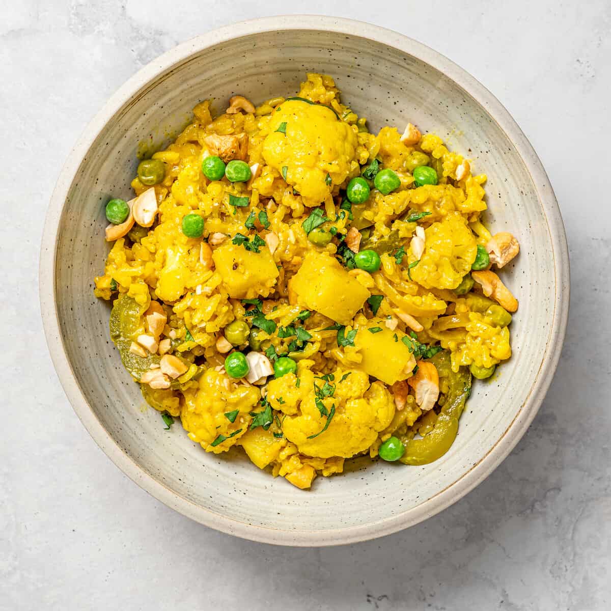 Overhead view of vegetable biryani in bowl