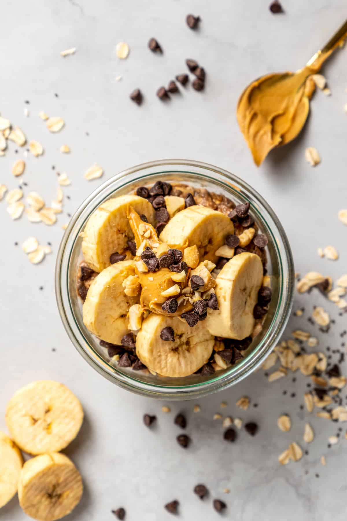 Overhead view of chocolate peanut butter high-protein overnight oats in jar