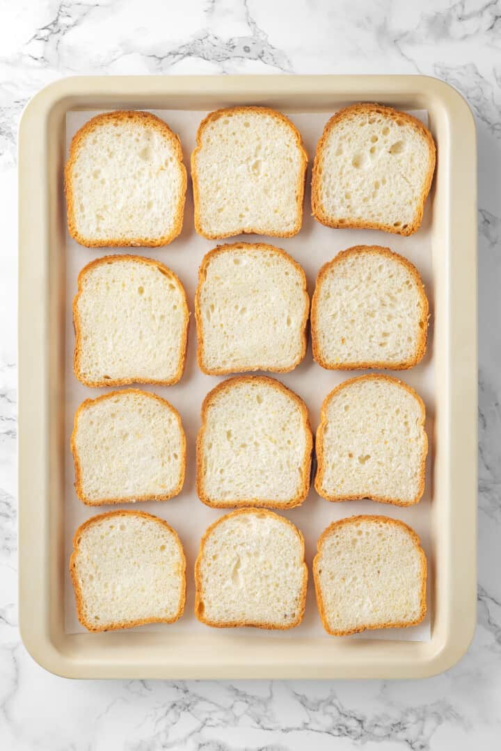 Overhead view of bread on sheet pan