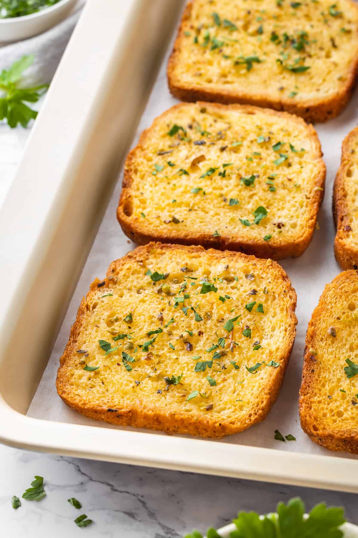 Slices of Texas toast on sheet pan