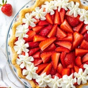 Overhead view of strawberry cream pie in glass pie pan