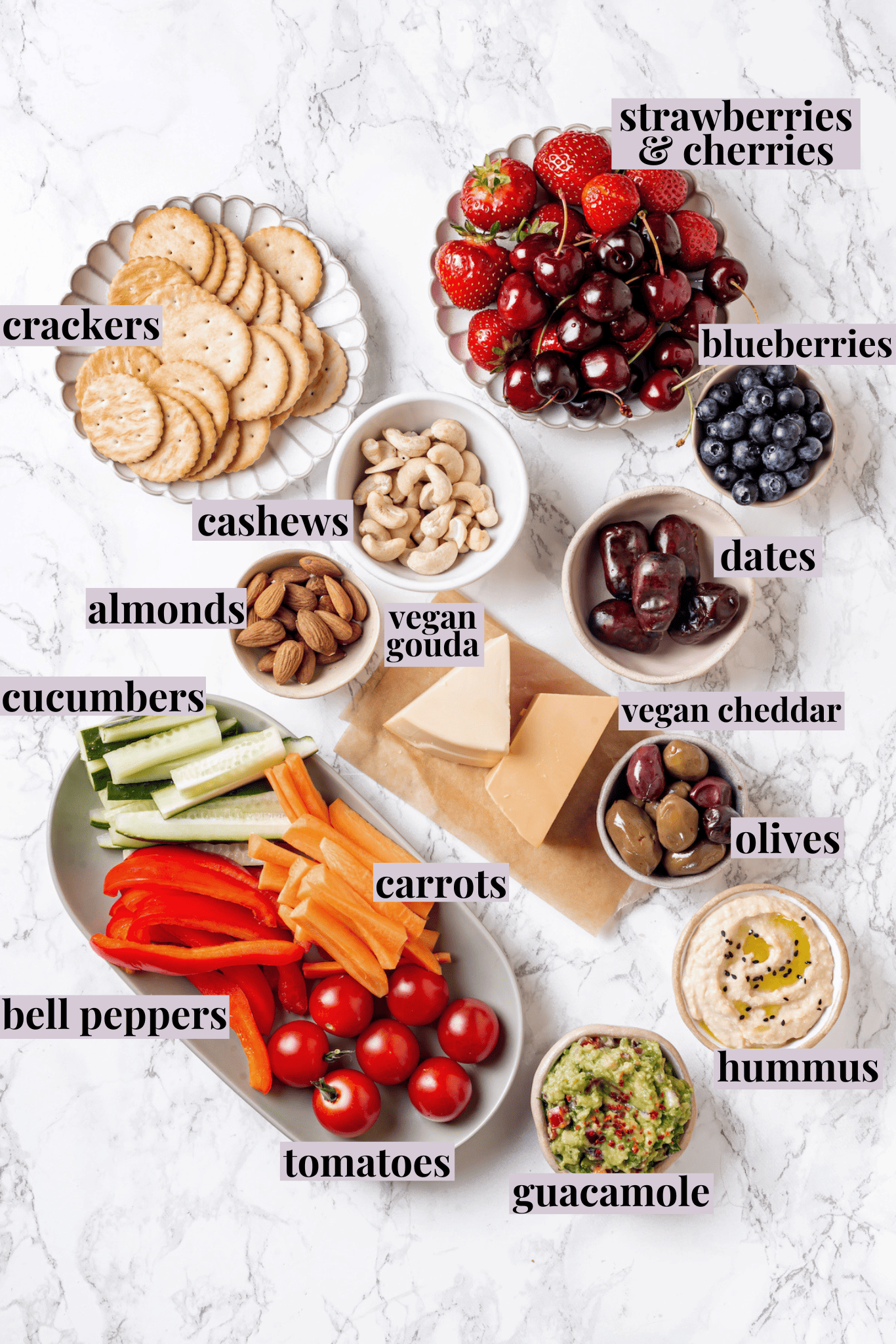 Overhead view of ingredients for vegan charcuterie board with labels
