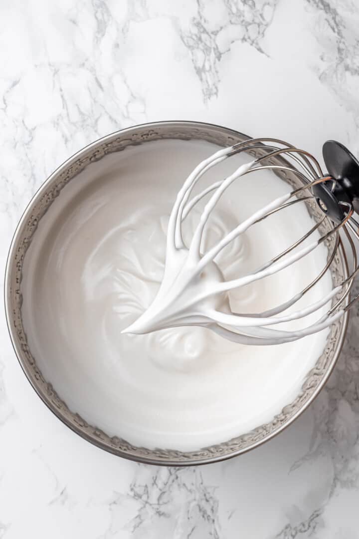 Overhead view of aquafaba mixture in bowl