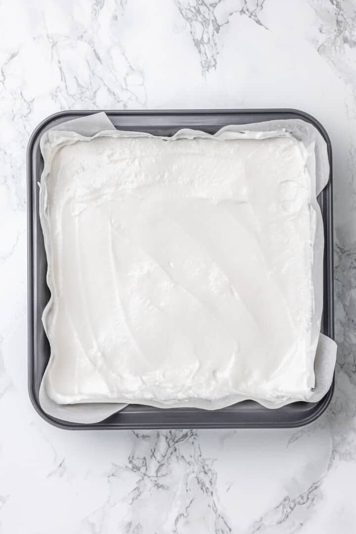 Overhead view of vegan marshmallow mixture in pan