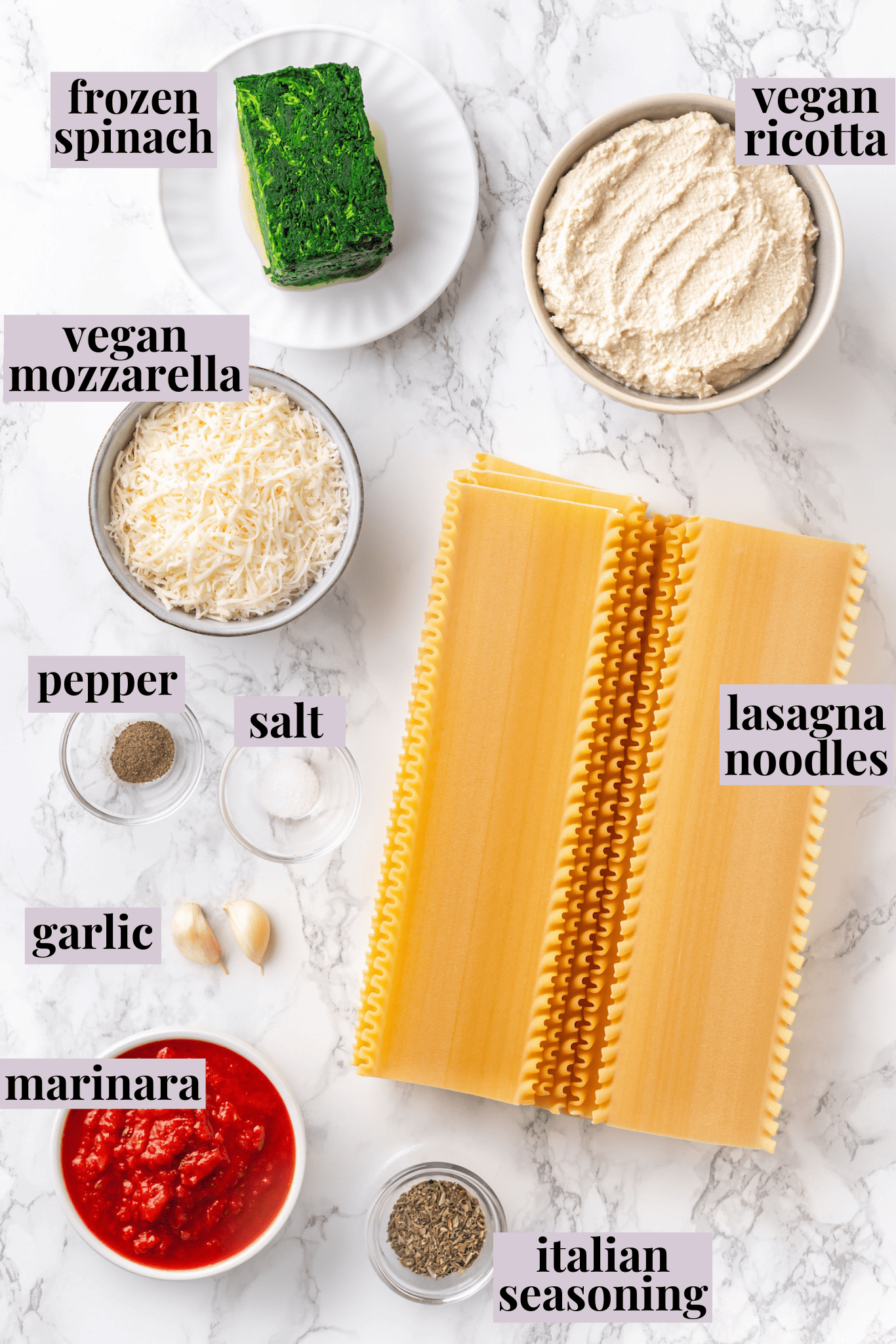 Overhead view of ingredients for vegan lasagna roll-ups with labels