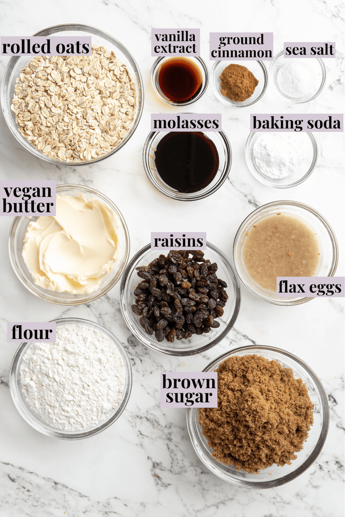 Overhead view of ingredients for vegan oatmeal cookies with labels