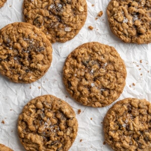 Overhead view of vegan oatmeal cookies on parchment paper