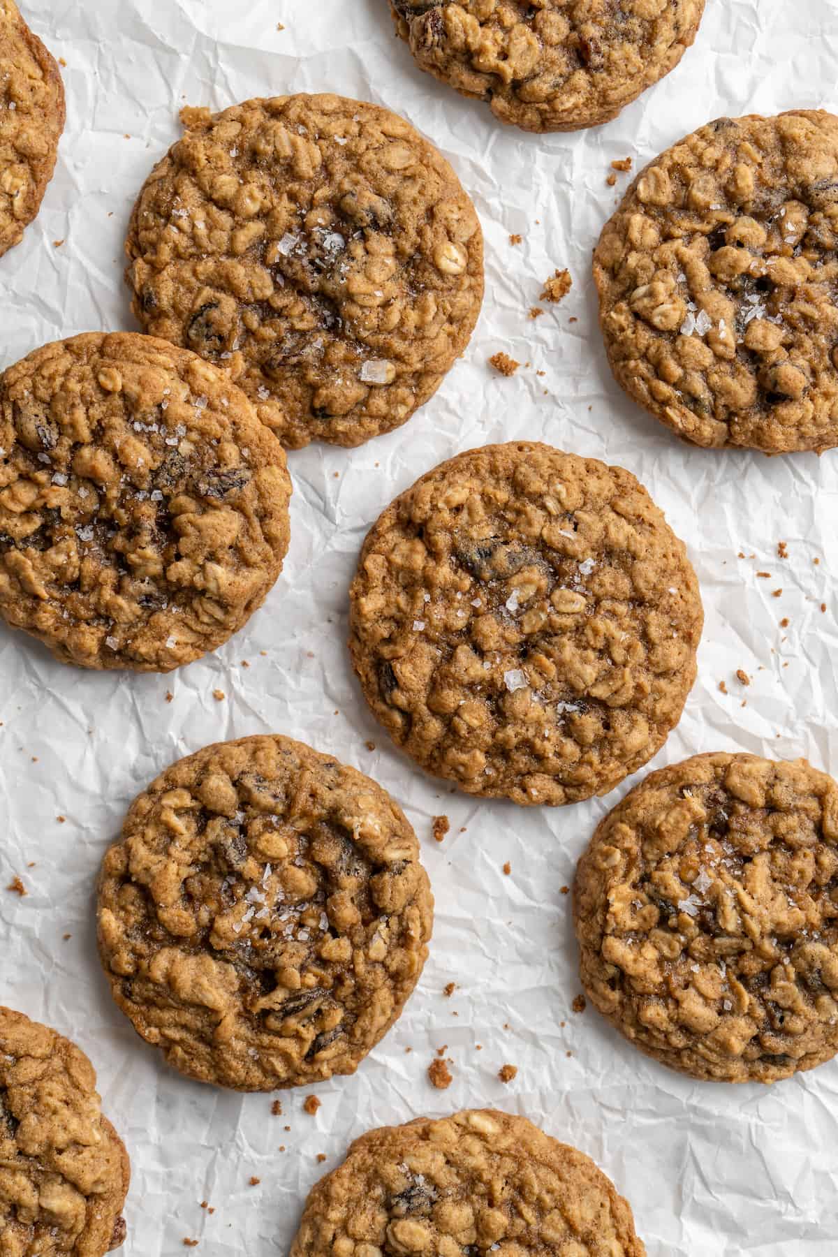 Overhead view of vegan oatmeal cookies on parchment paper