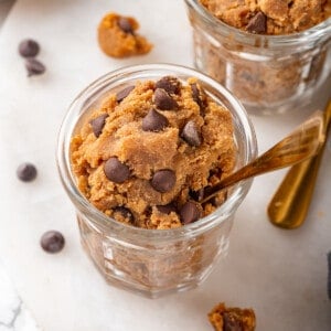 Two jars of protein cookie dough with chocolate chips