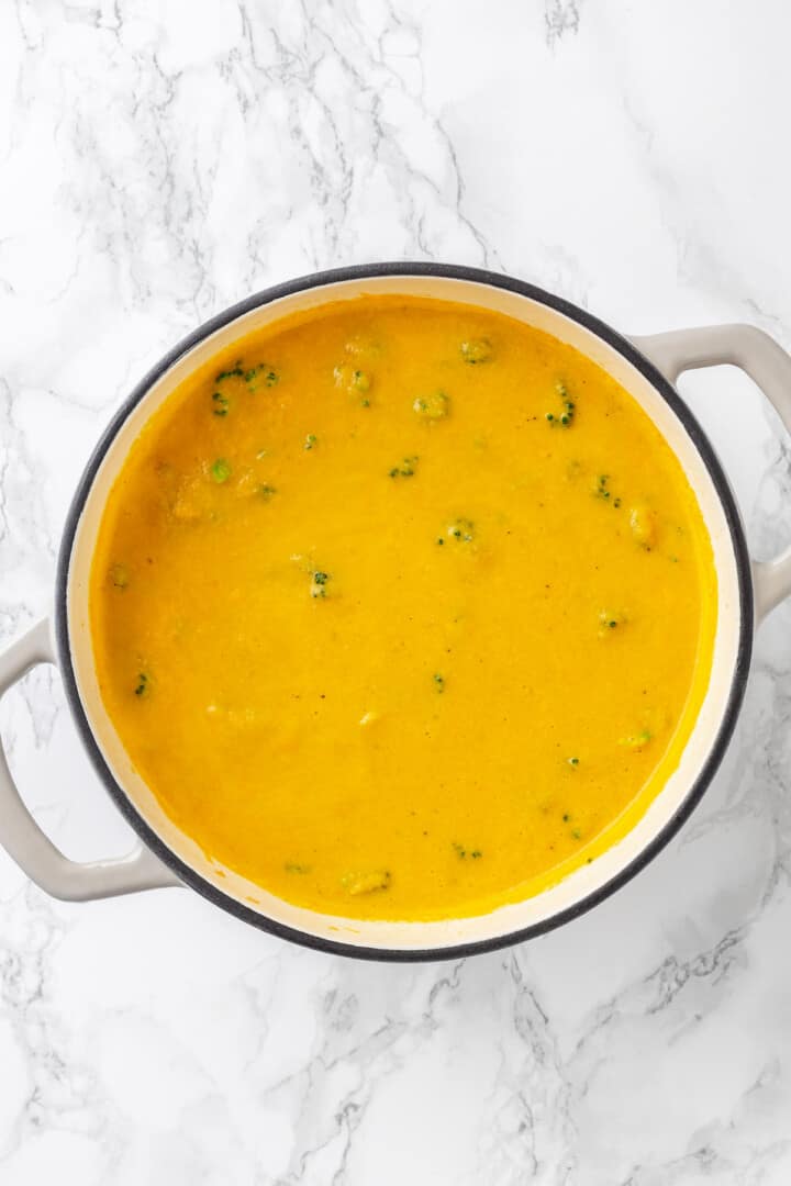 Overhead view of vegan broccoli cheddar soup in pot