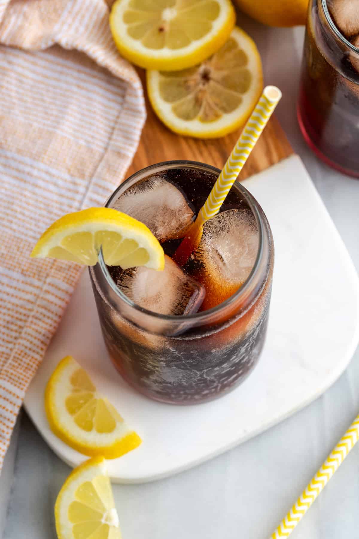 Top down view of Southern sweet tea in glass with ice and lemon slice