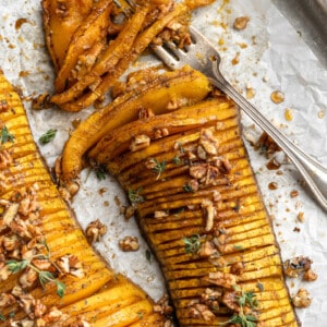 Overhead view of hasselback butternut squash with fork