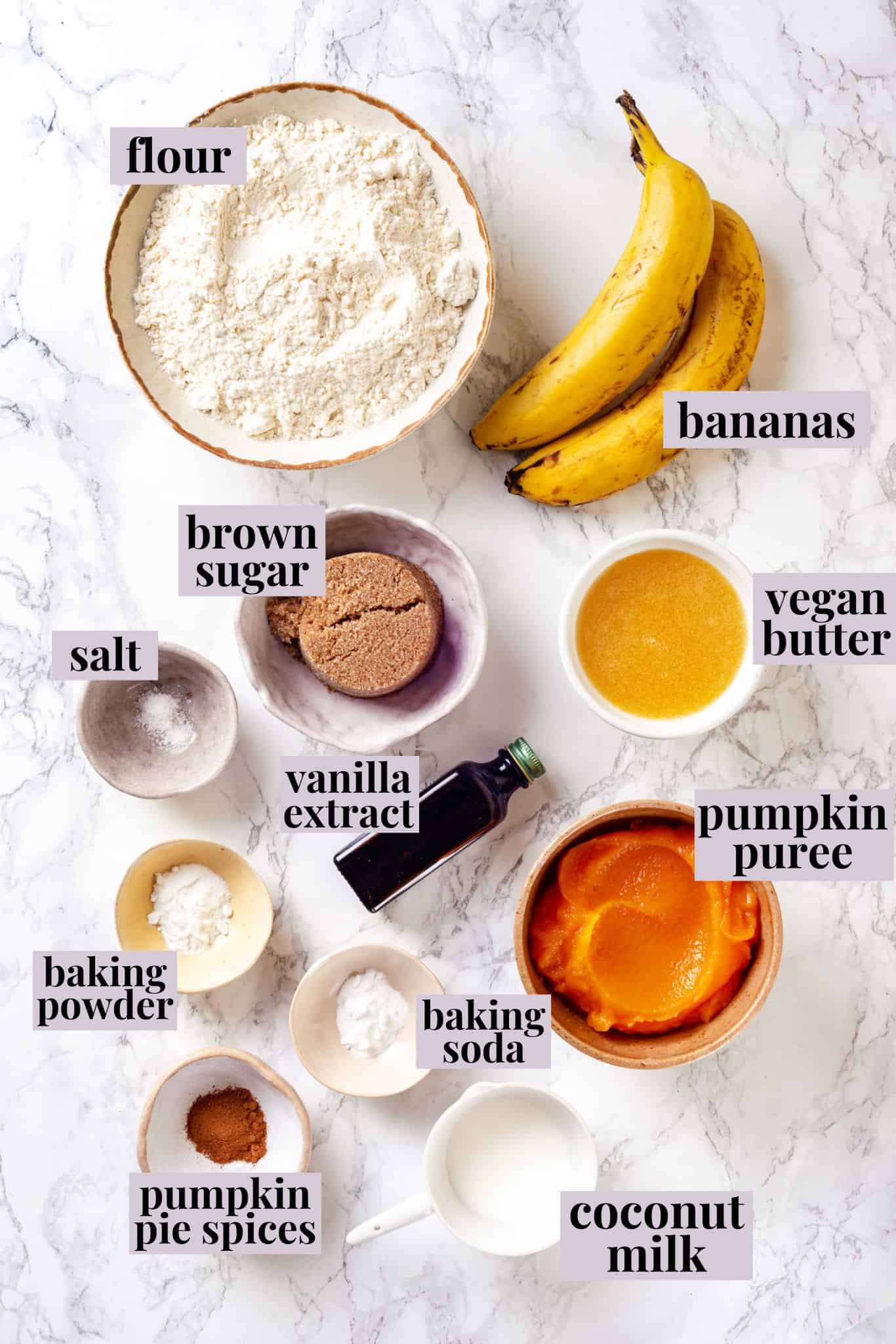 Overhead view of ingredients for pumpkin banana muffins with labels