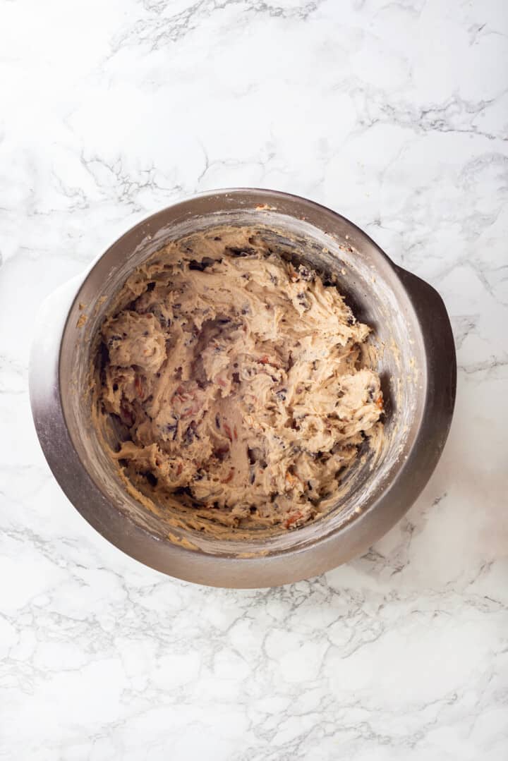 Overhead view of kitchen sink cookie dough in bowl
