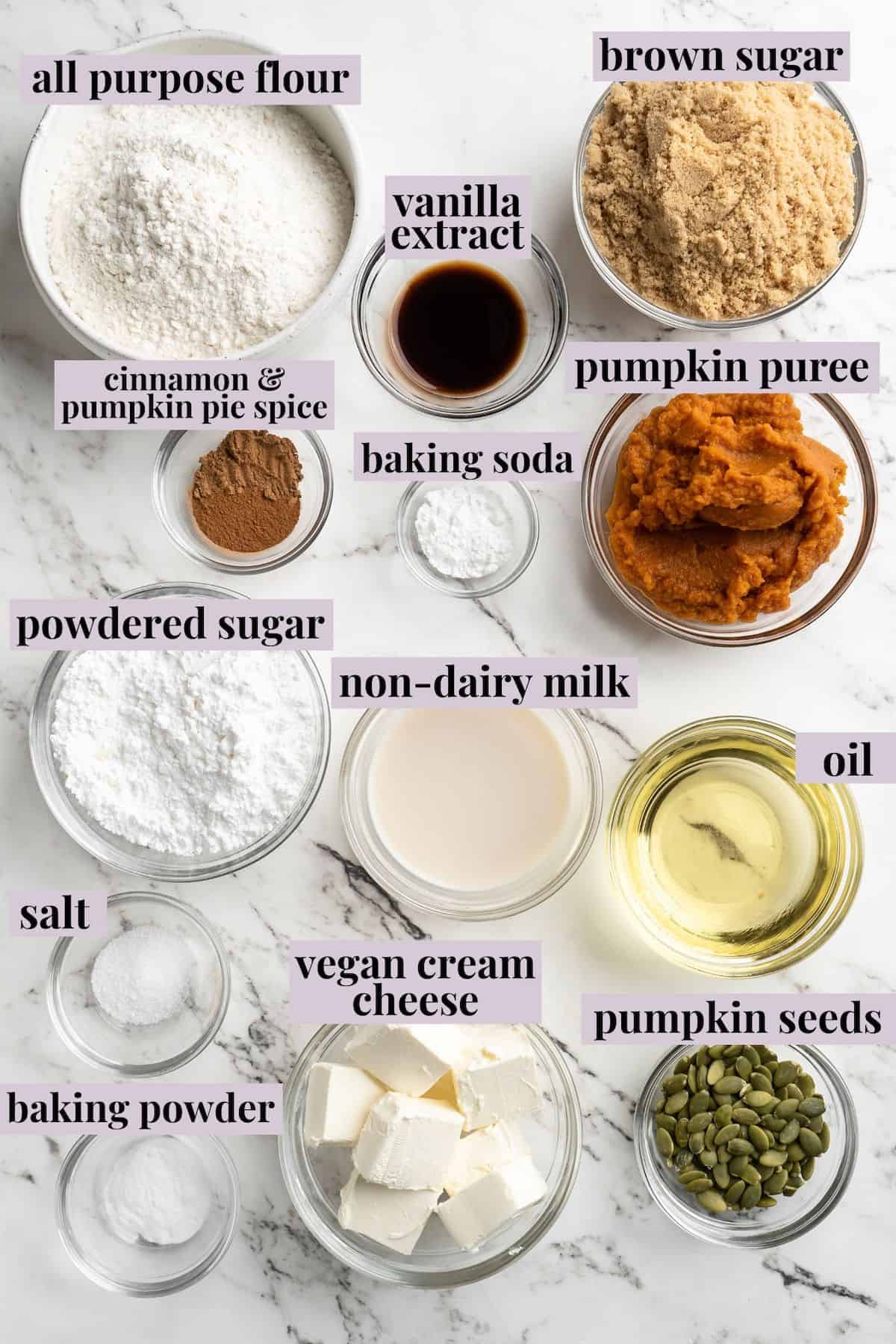 Overhead view of pumpkin cream cheese muffin ingredients with labels