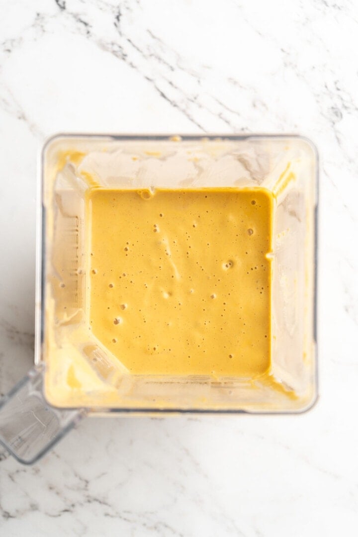 Overhead view of vegan queso in blender