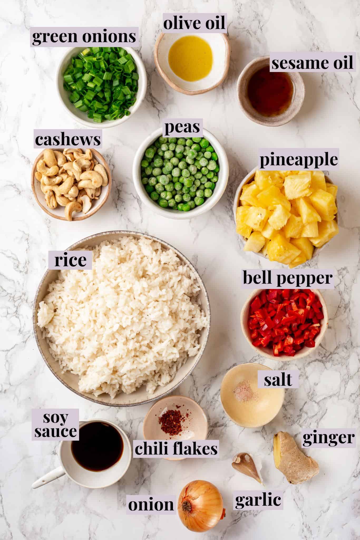 Overhead view of ingredients for pineapple fried rice