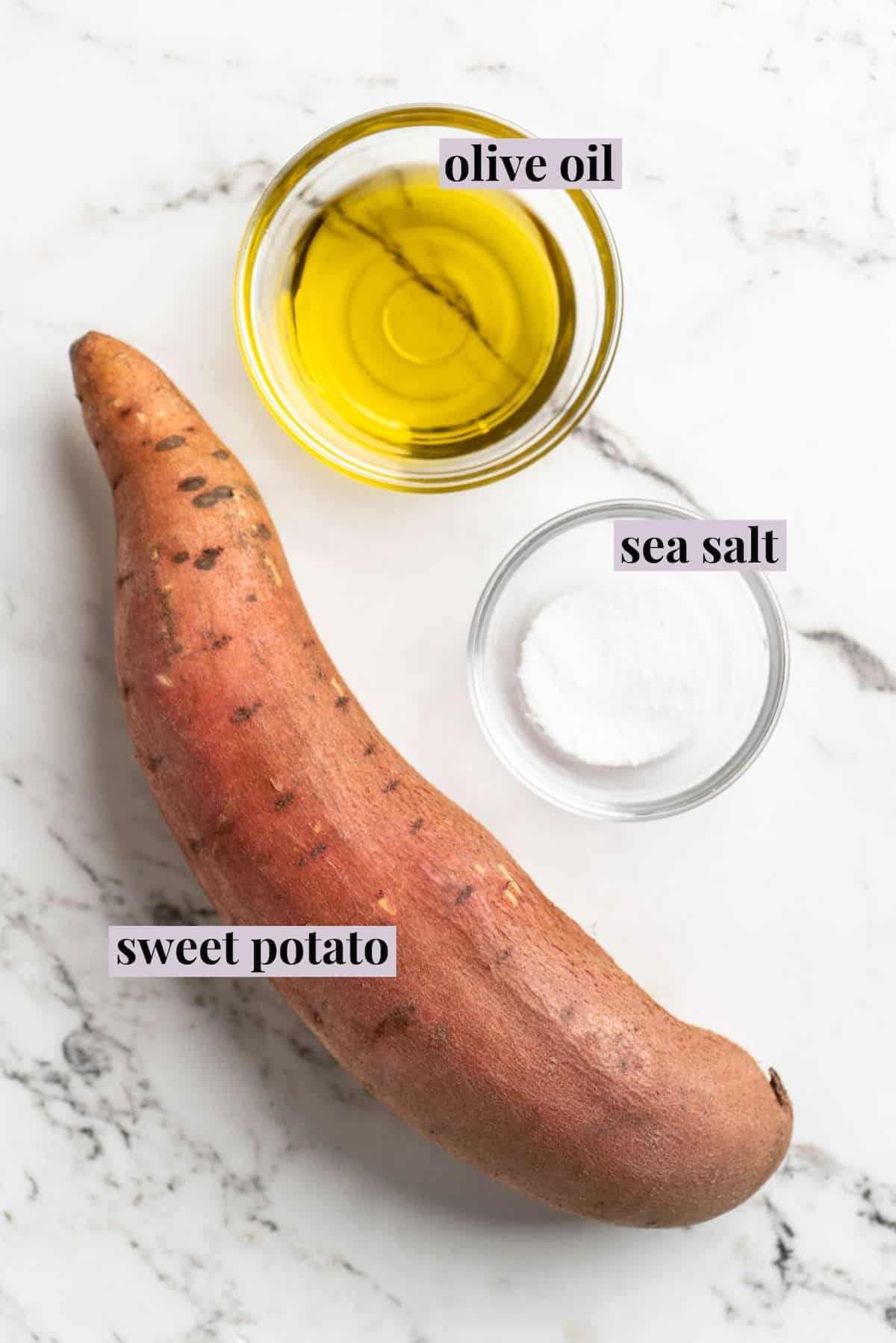 Overhead view of sweet potato, salt, and oil; ingredients for sweet potato chips