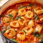 Pot of vegan tomato tortellini soup