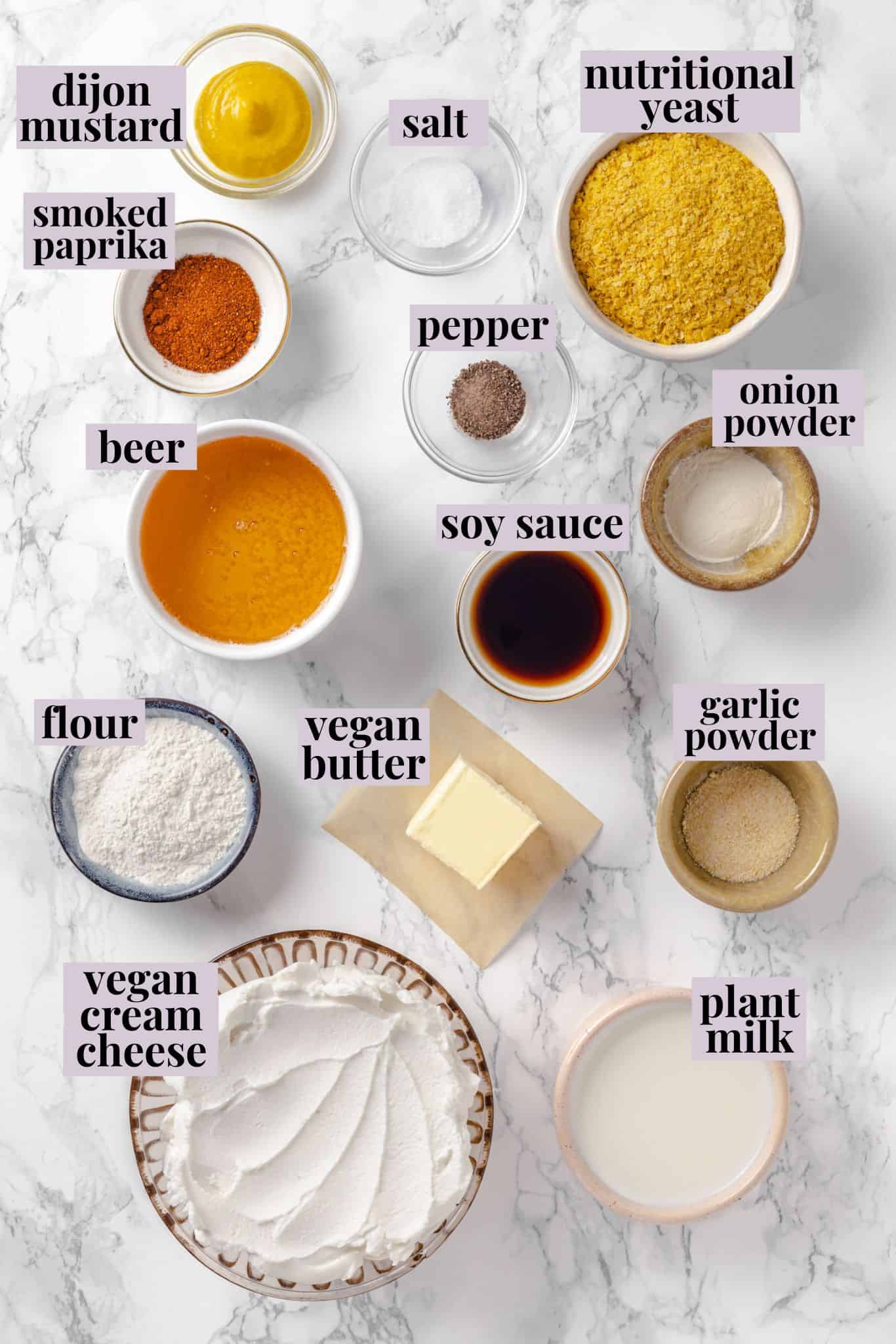 Overhead view of ingredients for vegan beer cheese pretzel dip with labels