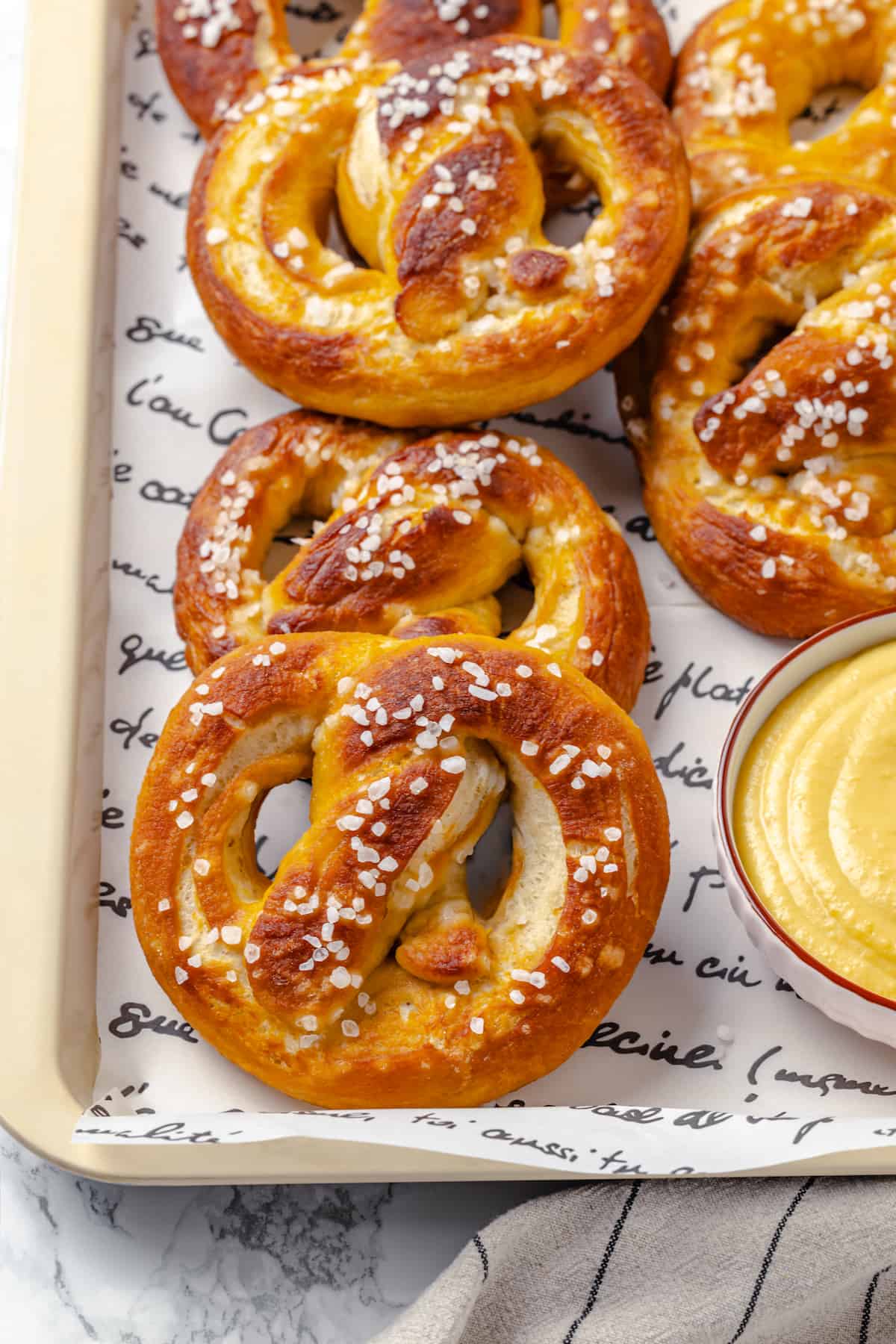 Overhead view of vegan soft pretzels on tray