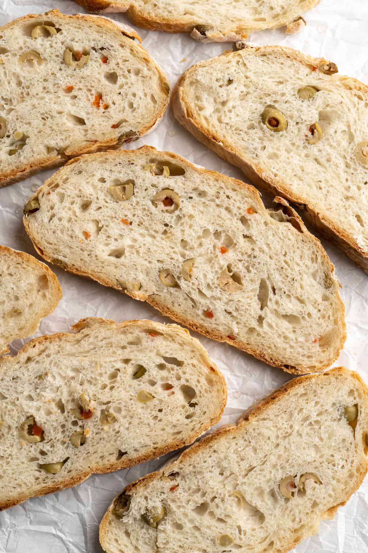 Overhead view of olive bread slices