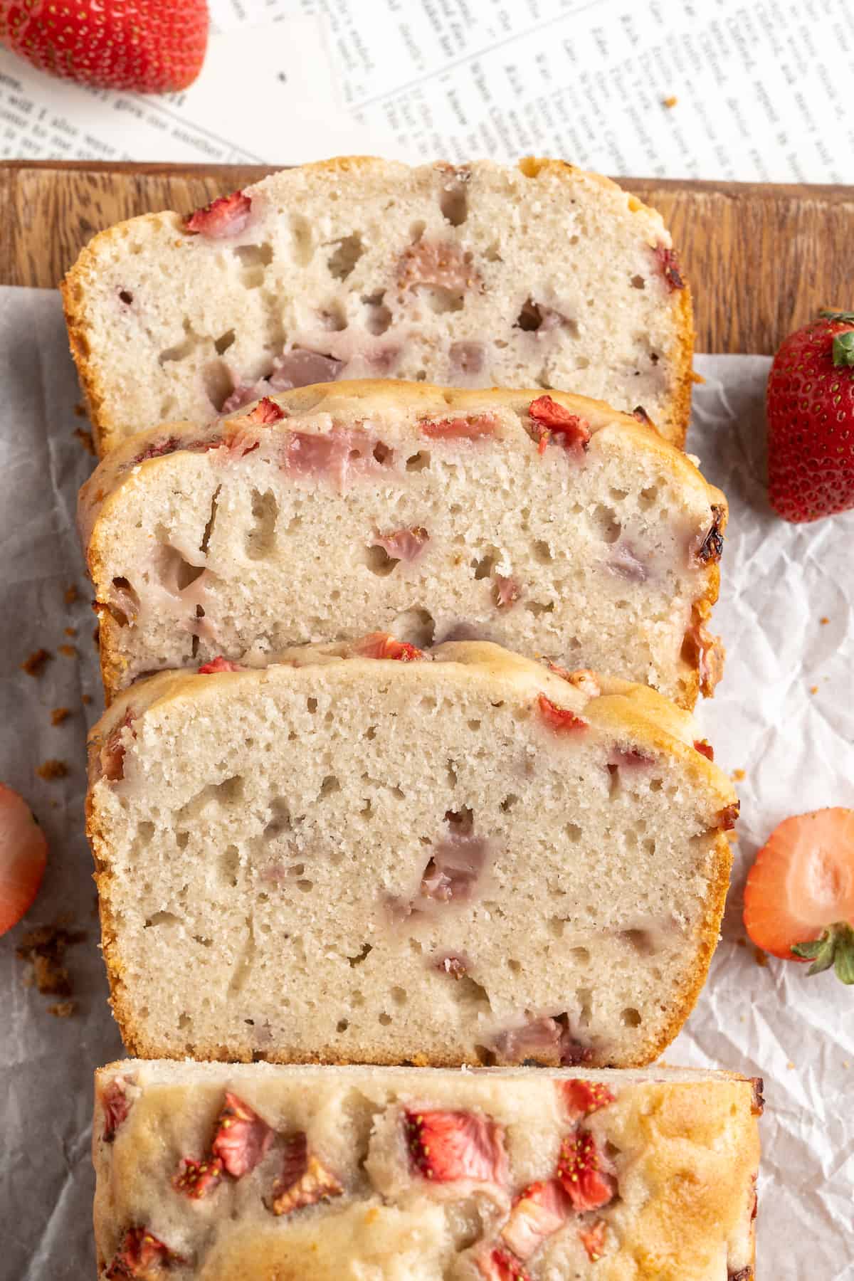 Overhead view of sliced strawberry banana bread loaf