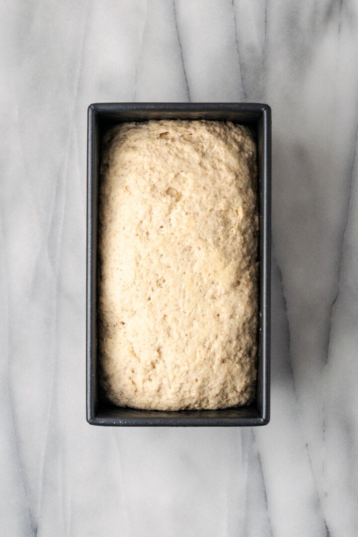Overhead view of gluten-free dough in bread pan