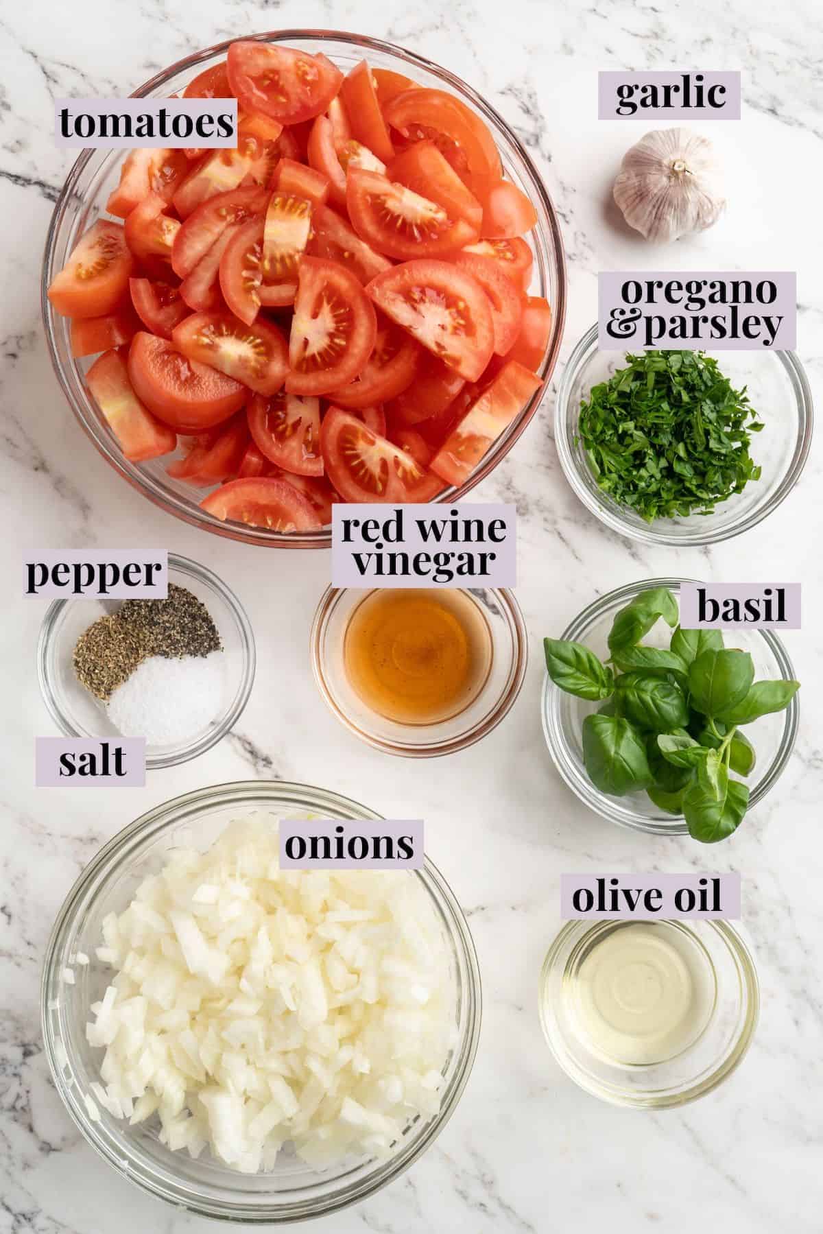 Overhead view of ingredients for homemade tomato sauce