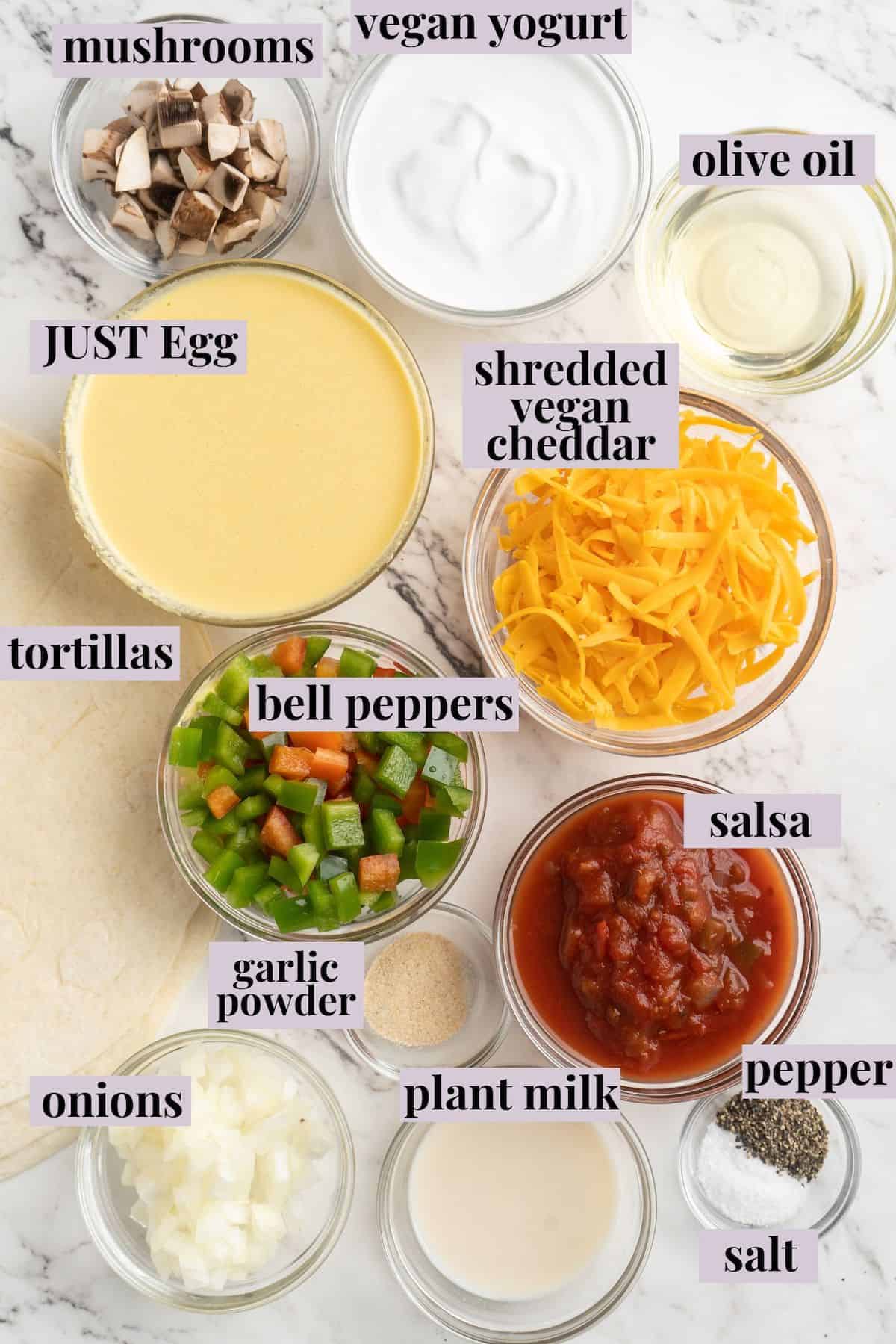 Overhead view of ingredients for vegan breakfast burritos with labels