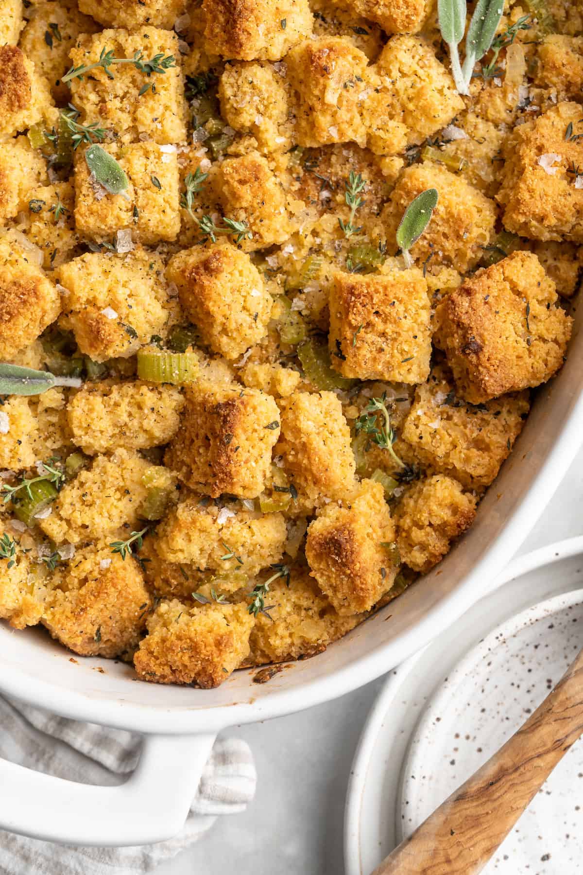 Overhead view of cornbread stuffing in baking dish