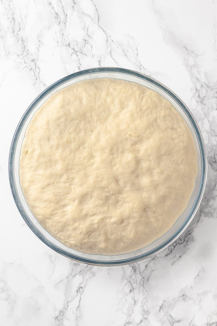 Overhead view of risen dough for pretzel bites
