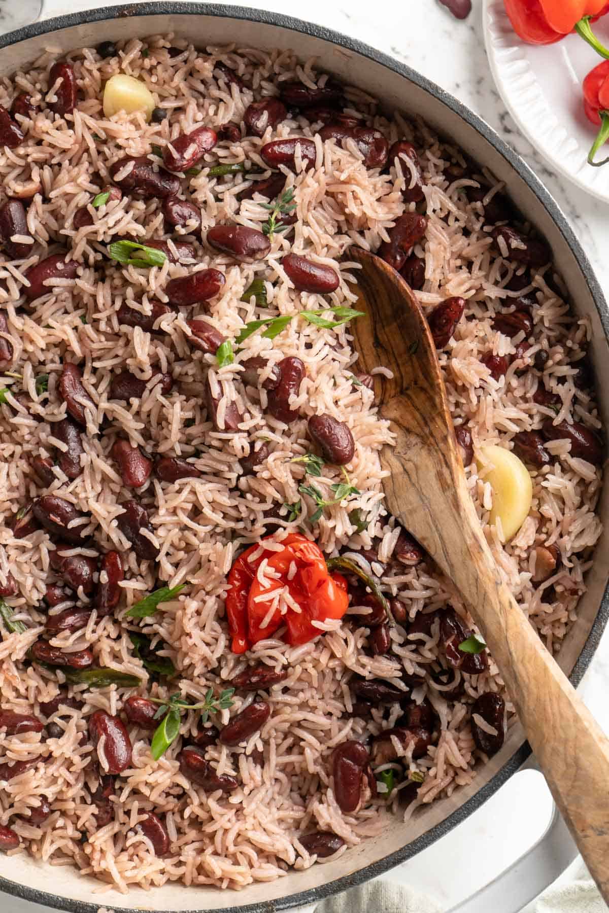 Top-down view of Jamaican rice and peas in skillet