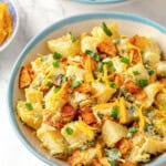 Baked loaded potato salad in bowl