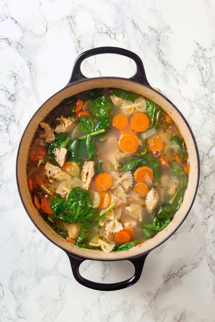 Vegan chicken noodle soup in Dutch oven