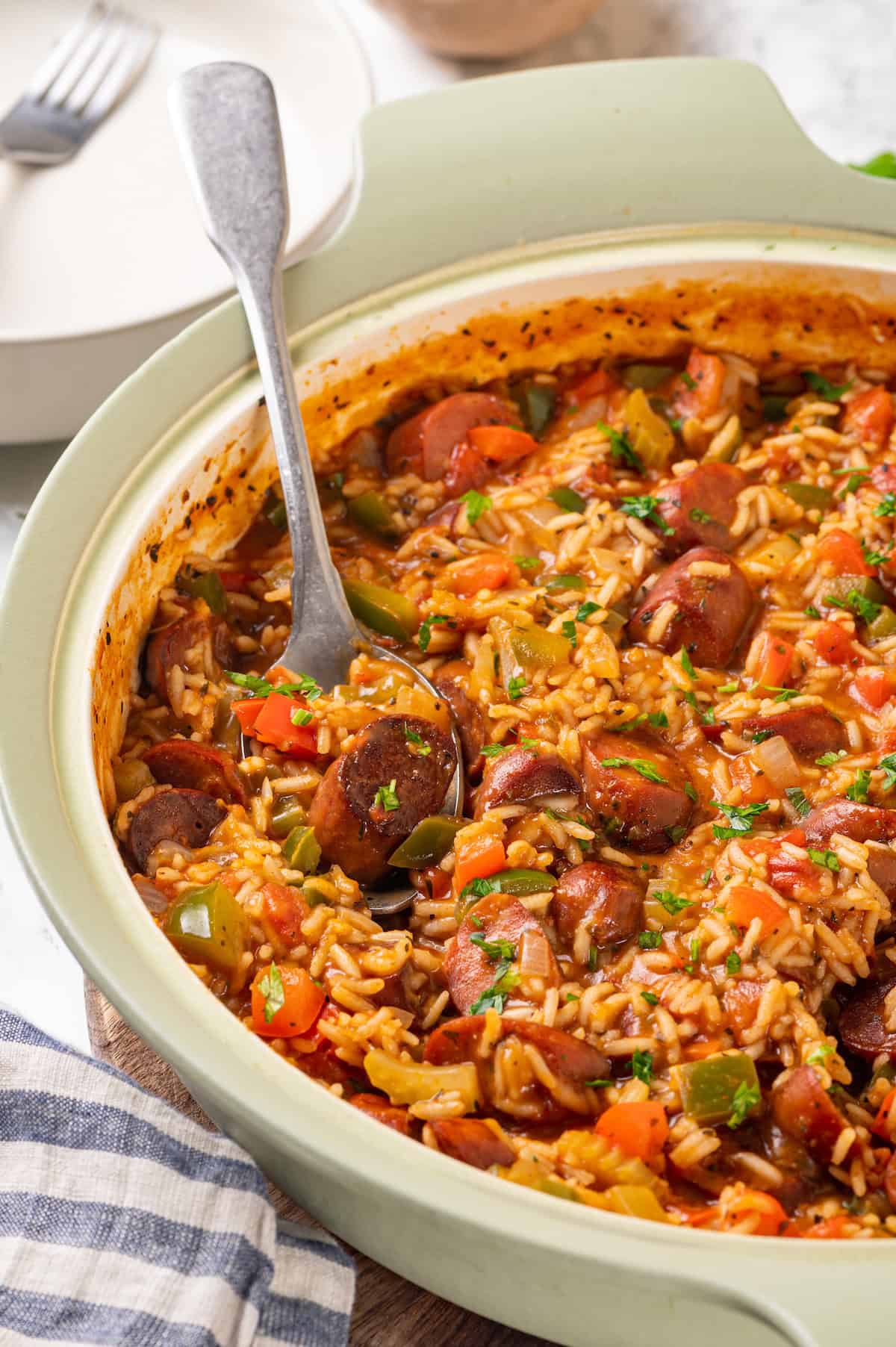 Spoonful of vegan jambalaya in skillet