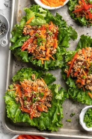 Overhead view of walnut meat lettuce wraps on sheet pan