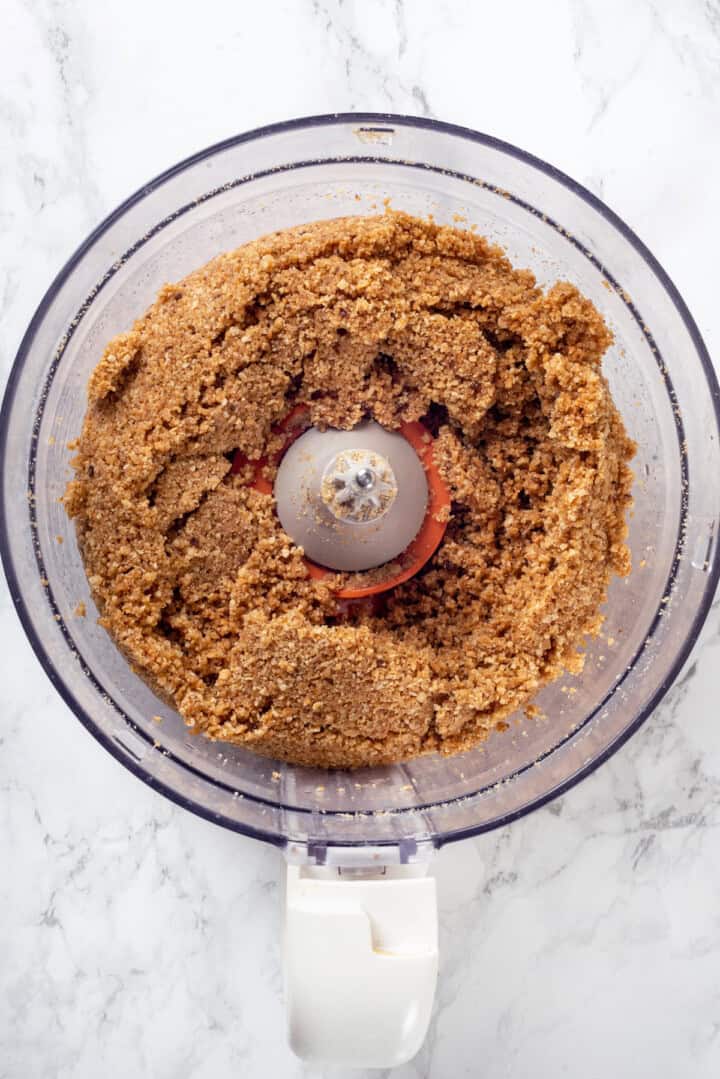 Overhead view of crust mixture for seven layer bars